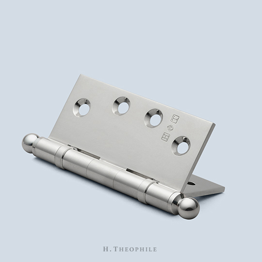 Wide-spaced, two ball bearing butt hinge to accept finial