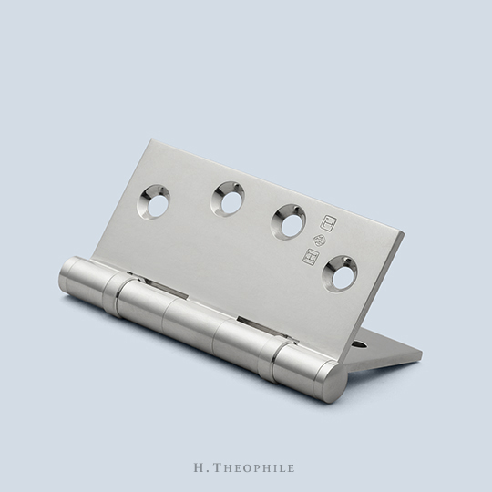 Wide-spaced, two ball bearing butt hinge to accept finial