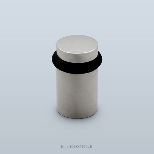 Cylindrical floor mounted door stop