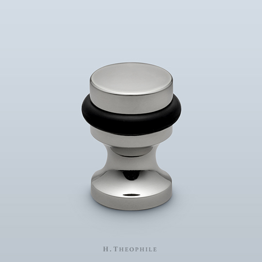 Cylindrical door stop with profiled base, floor mounted