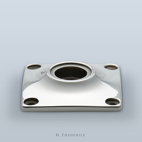 Square backplate with raised collar and visible screws