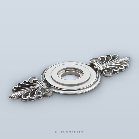 Decorative filigreed backplate