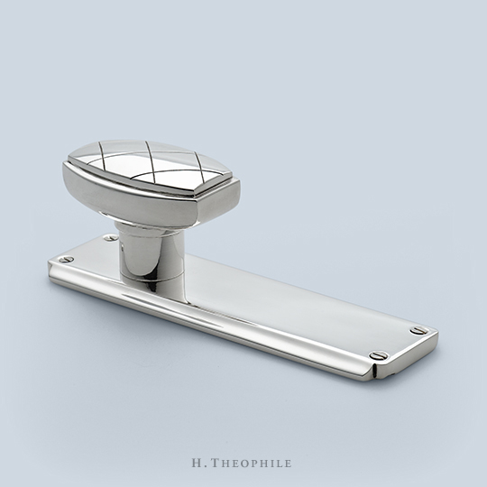 Knob with hand-chased crosshatch