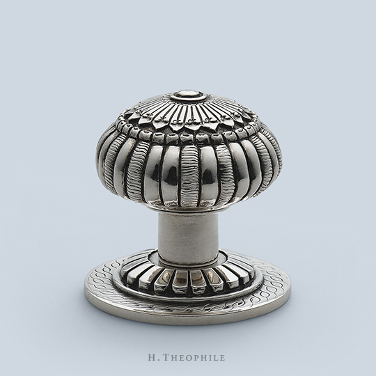 Adamesque feather knob