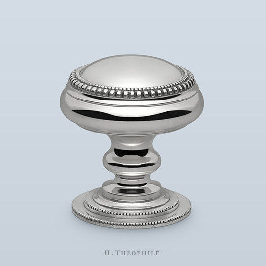 Knob with double beaded perimeter