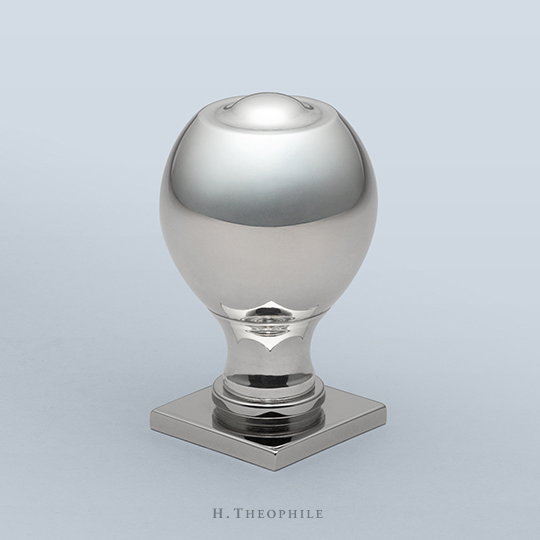 Elongated tall knob with dimple on top