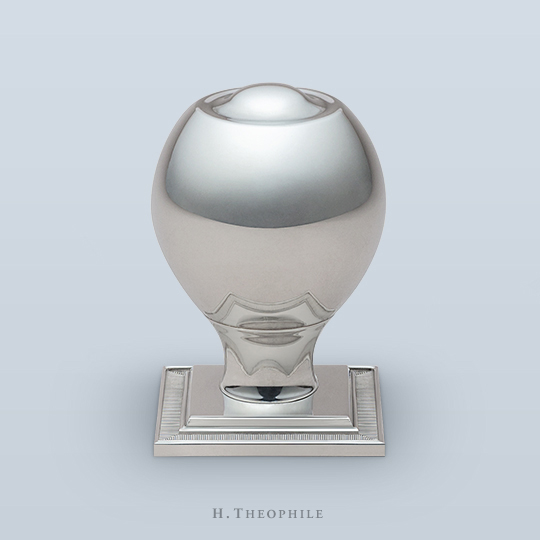 Elongated tall knob with dimple on top