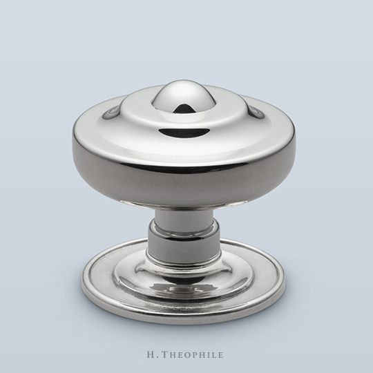 Round knob with raised center