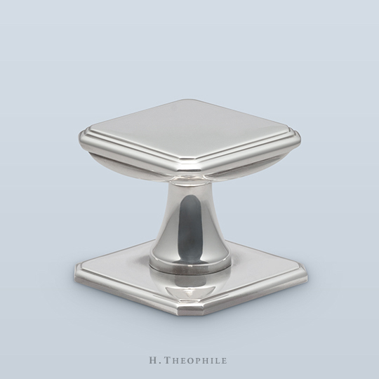 Antique square knob with flat, stepped face and clipped corners