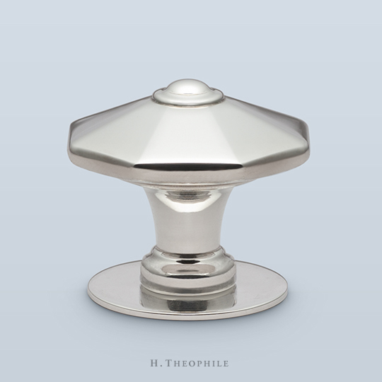 Pointed octagonal knob with center button