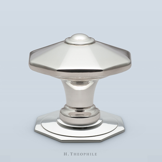 Pointed octagonal knob with center button