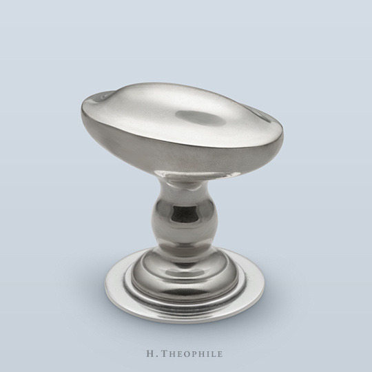 Convex oval knob with decorative shaft