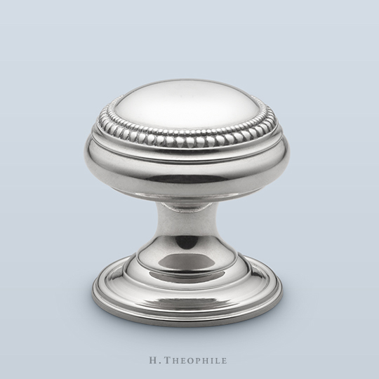 Knob with double beaded perimeter