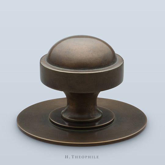 Round knob with domed face