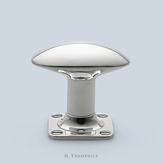 Elongated and flattened egg knob