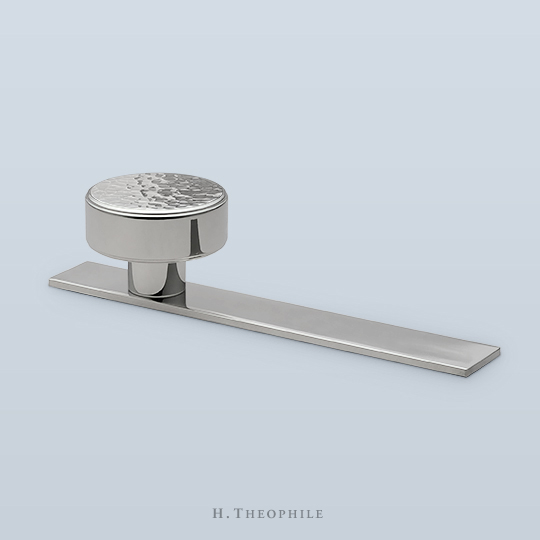 Bauhaus knob with perimeter edge detail and hammered face