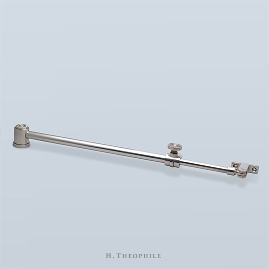 Casement stay with decorative knob and cap