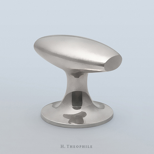 Antique oval knob with flattened edges and integral rosette