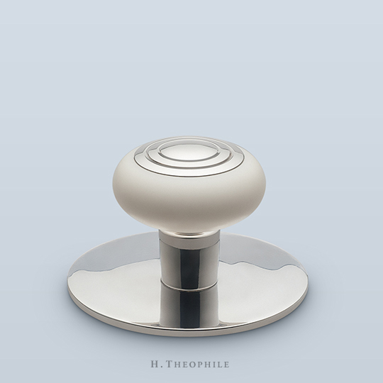 Corian cabinet pull with metal concentric circle center