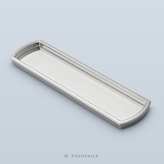 Oval recessed pull with edging
