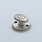 Oval thumbturn with floral motif