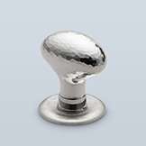 Simple hammered egg knob