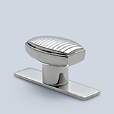 Knob with hand-chased linear motif