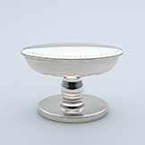 Knob with perimeter engraving