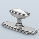 Rectangular knob with stepped perimeter and convex face