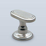 Pill-shaped knob with textured center face