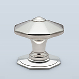 Pointed octagonal knob with center button