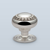Round knob with central decorative motif