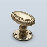 Oval knob with petals at perimeter