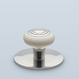 Corian cabinet pull with metal concentric circle center