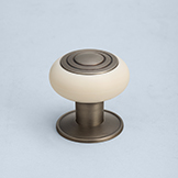 Corian cabinet pull with metal concentric circle center